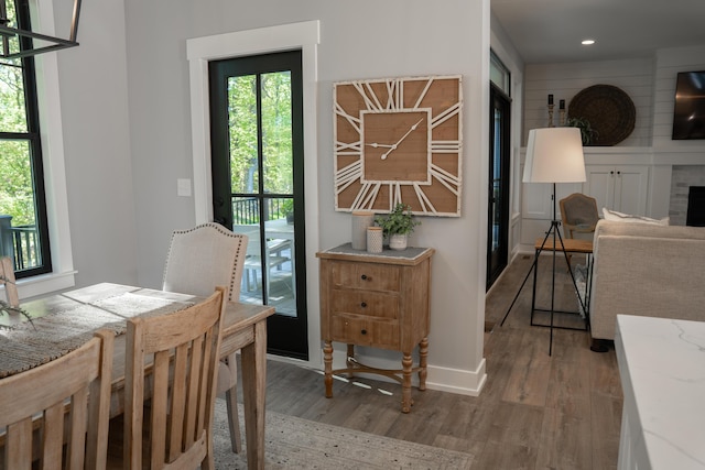 8182 Country Rail Dr SW, Byron Center, MI 49315 - dining room with wood finished floors, baseboards, and recessed lighting