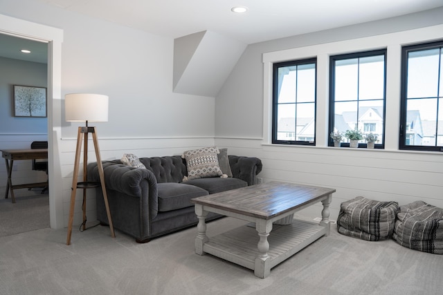 8182 Country Rail Dr SW, Byron Center, MI 49315 - living room featuring light colored carpet, healthy amount of natural light, a wainscoted wall, and recessed lighting