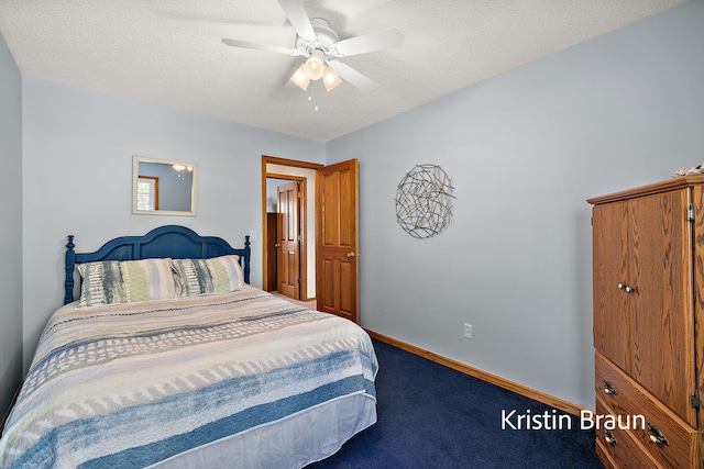 carpeted bedroom featuring baseboards, ceiling fan, and a textured ceiling