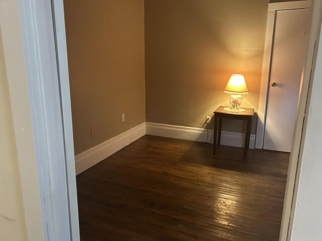 1902 W Ogilvie Ave, Baldwin, MI 49304 - spare room with hardwood / wood-style flooring and baseboards