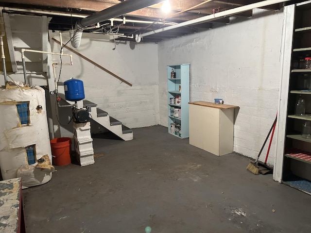 1902 W Ogilvie Ave, Baldwin, MI 49304 - unfinished below grade area featuring stairway