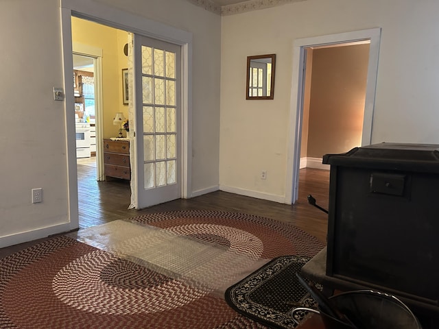1902 W Ogilvie Ave, Baldwin, MI 49304 - doorway to outside with dark wood finished floors and baseboards