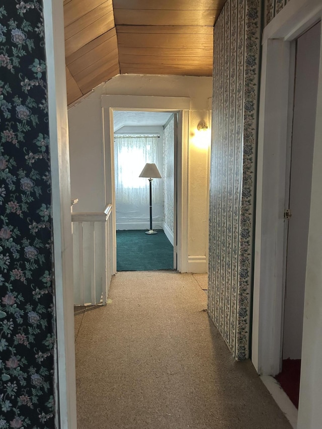 1902 W Ogilvie Ave, Baldwin, MI 49304 - corridor with carpet floors, lofted ceiling, wood ceiling, and wallpapered walls