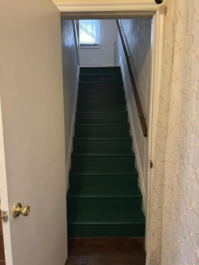 1902 W Ogilvie Ave, Baldwin, MI 49304 - stairs featuring wood finished floors