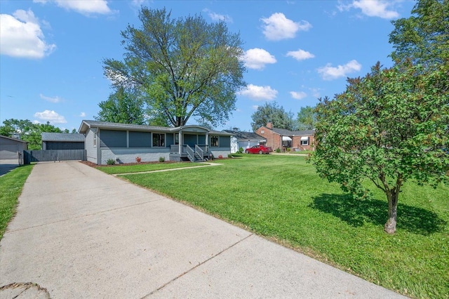 13665 Ida Ave, Warren, MI 48089 - ranch-style home featuring concrete driveway and brick siding