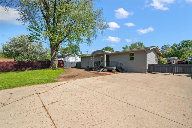 13665 Ida Ave, Warren, MI 48089 - view of front facade with a gate