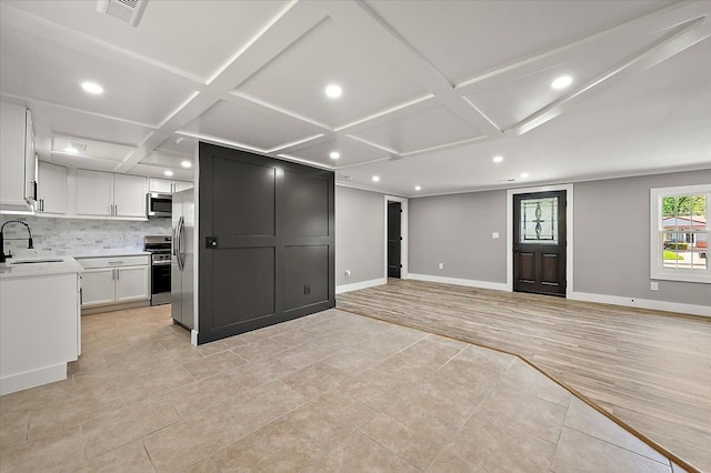 13665 Ida Ave, Warren, MI 48089 - unfurnished living room featuring a sink, recessed lighting, light tile patterned floors, baseboards, and coffered ceiling