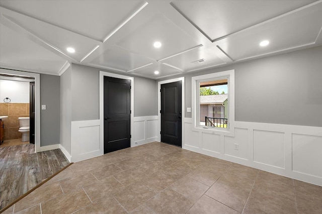 13665 Ida Ave, Warren, MI 48089 - tiled spare room featuring coffered ceiling, recessed lighting, and a wainscoted wall