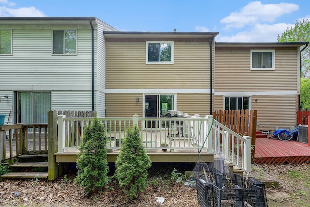 3472 Burbank Dr, Ann Arbor, MI 48105 - rear view of property with a deck and cooling unit