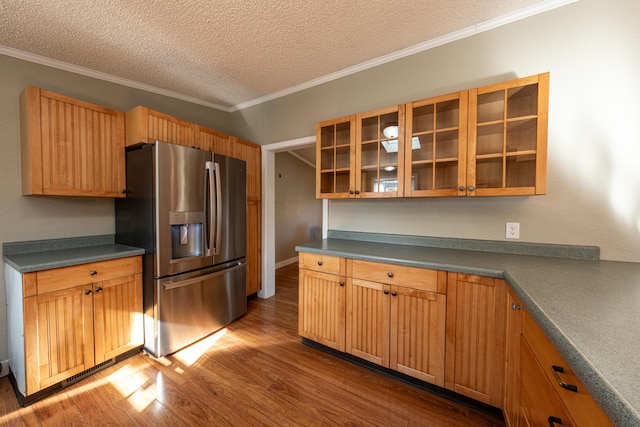 2330 N Rath Rd, Ludington, MI 49431 - kitchen with stainless steel fridge with ice dispenser, dark wood-type flooring, a textured ceiling, crown molding, and glass insert cabinets