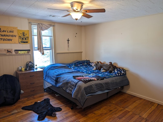 120 N Main St, Scottville, MI 49454 - bedroom featuring hardwood / wood-style flooring and ceiling fan