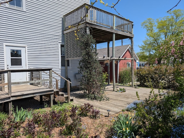 120 N Main St, Scottville, MI 49454 - rear view of property with a deck