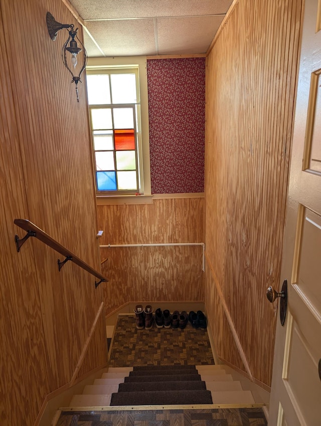 120 N Main St, Scottville, MI 49454 - stairs with wood walls