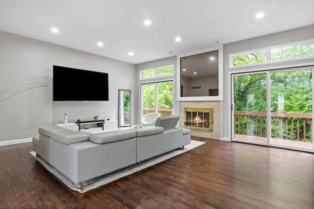4578 Pine Village Dr, West Bloomfield, MI 48323 - living area with a tile fireplace, dark wood finished floors, recessed lighting, and baseboards