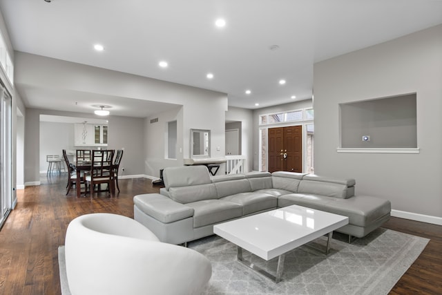 4578 Pine Village Dr, West Bloomfield, MI 48323 - living room featuring dark wood-style flooring, baseboards, and recessed lighting