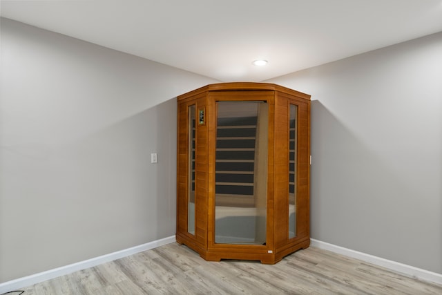 4578 Pine Village Dr, West Bloomfield, MI 48323 - sauna / steam room with wood finished floors, baseboards, and recessed lighting