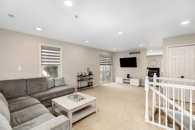 50107 Harding St, Canton, MI 48188 - living area featuring recessed lighting, light carpet, and baseboards