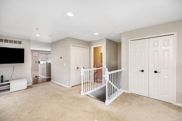 50107 Harding St, Canton, MI 48188 - hallway featuring an upstairs landing, carpet floors, baseboards, and recessed lighting