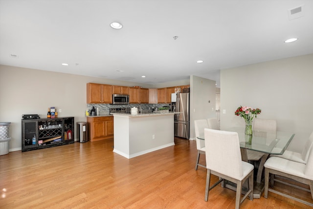 50107 Harding St, Canton, MI 48188 - dining area with light wood finished floors and recessed lighting