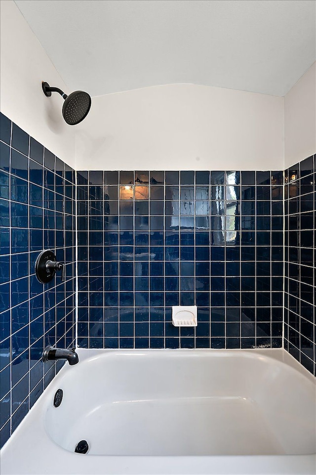 bathroom with shower / bath combination