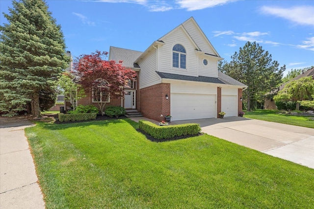 19880 Irving Dr, Livonia, MI 48152 - view of front facade with a garage, brick siding, concrete driveway, a front yard, and roof with shingles