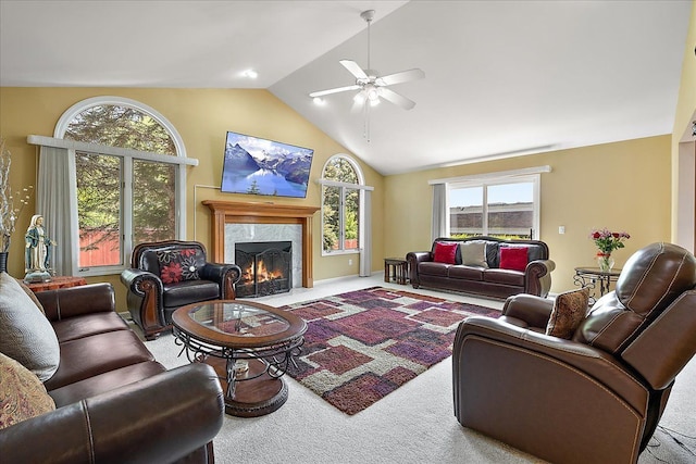 19880 Irving Dr, Livonia, MI 48152 - living room featuring carpet, a ceiling fan, a high end fireplace, and high vaulted ceiling