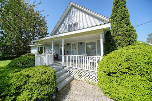 204 Parker St, Cement City, MI 49233 - view of front of home featuring a porch