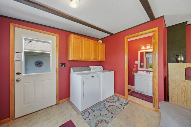 204 Parker St, Cement City, MI 49233 - washroom with washer and dryer, cabinet space, and baseboards