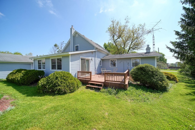 204 Parker St, Cement City, MI 49233 - rear view of property featuring a wooden deck, a yard, and a chimney