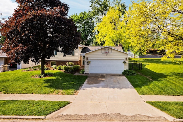 160 Cherry St, Milan, MI 48160 - view of front facade with a front lawn, an attached garage, concrete driveway, and brick siding