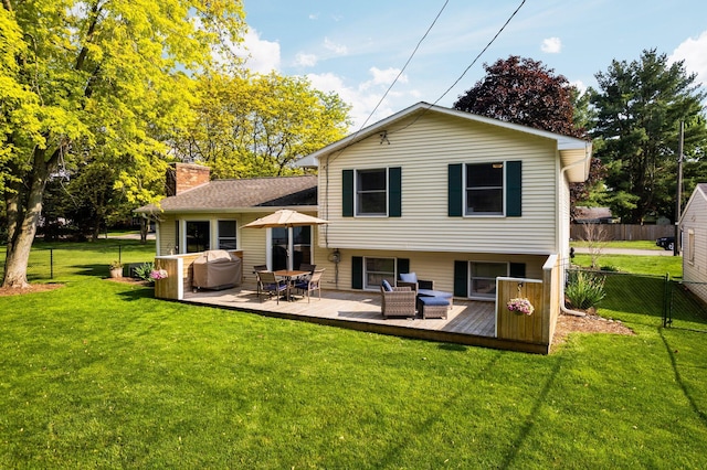 160 Cherry St, Milan, MI 48160 - back of property with a wooden deck and a chimney