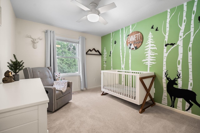160 Cherry St, Milan, MI 48160 - bedroom featuring light carpet, a crib, baseboards, and ceiling fan