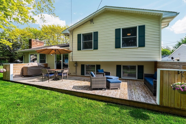 160 Cherry St, Milan, MI 48160 - rear view of property with a deck and a lawn