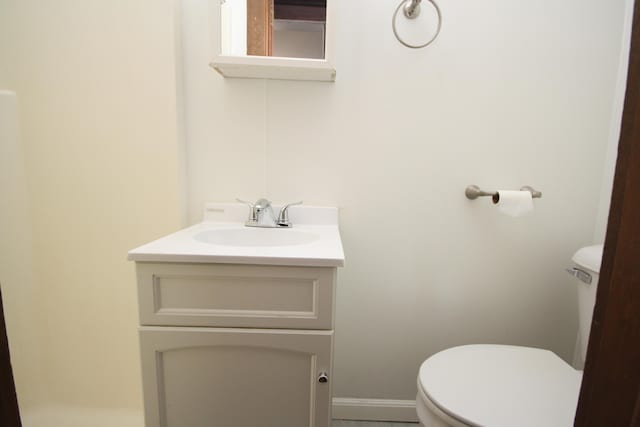 212 Rose Pl, Kalamazoo, MI 49001 - half bathroom with toilet and vanity