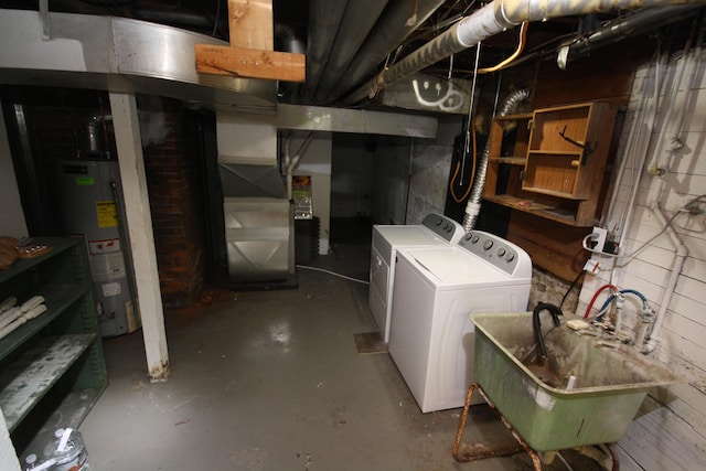 212 Rose Pl, Kalamazoo, MI 49001 - unfinished basement featuring water heater, independent washer and dryer, a sink, and heating unit