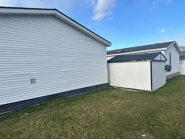 33332 Fern Ct, Lenox, MI 48048 - view of property exterior with a storage unit, a lawn, and an outdoor structure