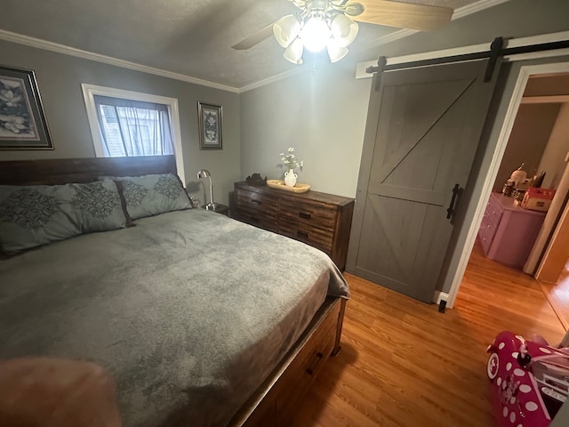 33332 Fern Ct, Lenox, MI 48048 - bedroom with a barn door, crown molding, light wood finished floors, and ceiling fan