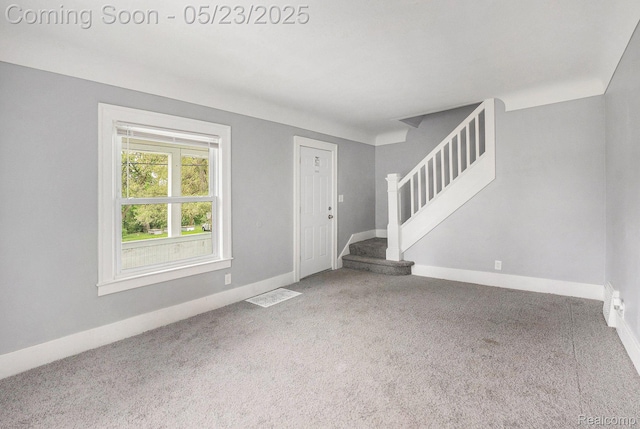 54 Hudson Ave, Pontiac, MI 48342 - entrance foyer with carpet flooring, stairway, and baseboards