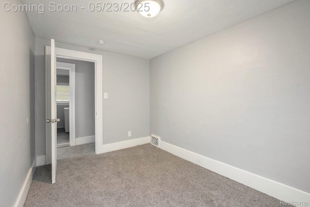 54 Hudson Ave, Pontiac, MI 48342 - carpeted empty room featuring baseboards