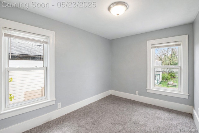 54 Hudson Ave, Pontiac, MI 48342 - carpeted spare room featuring healthy amount of natural light and baseboards