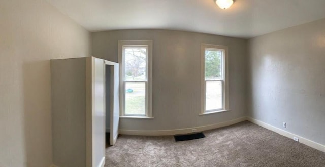 1030 Eastern Ave SE, Grand Rapids, MI 49507 - carpeted spare room with baseboards