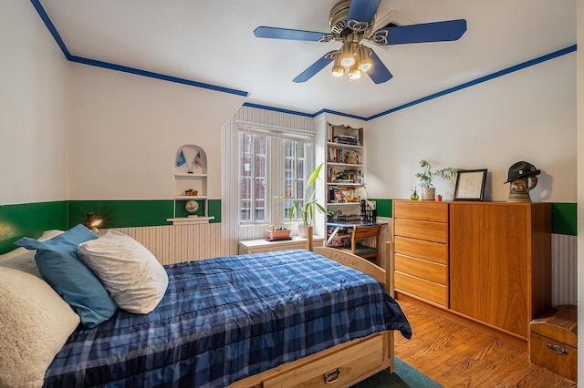 1602 Linwood Ave, Flint, MI 48503 - bedroom with crown molding, wood finished floors, and a ceiling fan