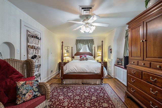 1602 Linwood Ave, Flint, MI 48503 - bedroom featuring dark wood-style floors, a ceiling fan, and crown molding