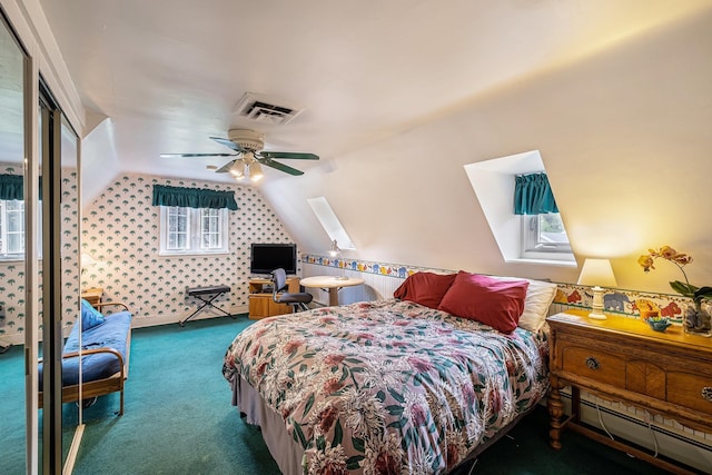 1602 Linwood Ave, Flint, MI 48503 - carpeted bedroom with baseboard heating, vaulted ceiling, a closet, wallpapered walls, and ceiling fan