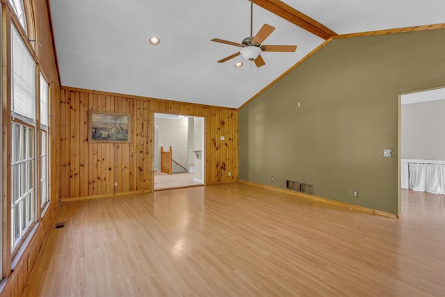 11317 N Dr, Brooklyn, MI 49230 - spare room featuring ceiling fan, wood finished floors, wood walls, baseboards, and recessed lighting