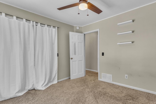 11317 N Dr, Brooklyn, MI 49230 - unfurnished bedroom with carpet, baseboards, and ceiling fan