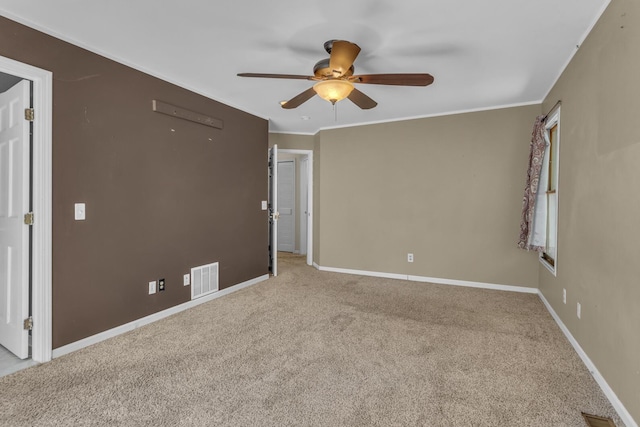 11317 N Dr, Brooklyn, MI 49230 - unfurnished room with a ceiling fan, carpet floors, baseboards, and ornamental molding