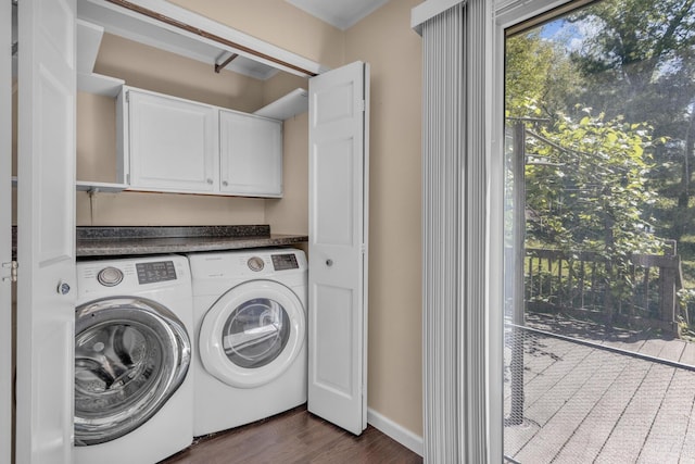 11317 N Dr, Brooklyn, MI 49230 - laundry area featuring washer and dryer, dark wood finished floors, and cabinet space