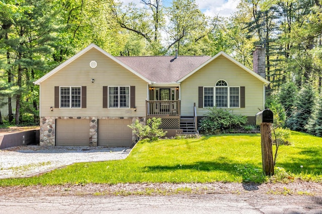 11317 N Dr, Brooklyn, MI 49230 - single story home featuring a chimney, a front yard, an attached garage, roof with shingles, and stone siding