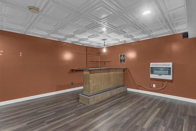 11317 N Dr, Brooklyn, MI 49230 - spare room with heating unit, an ornate ceiling, baseboards, and wood finished floors